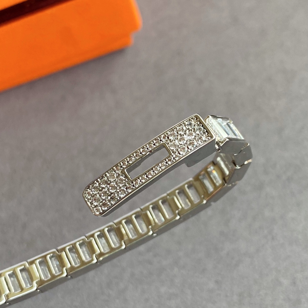 hermès button trapezoid Di*m*nd bracelet