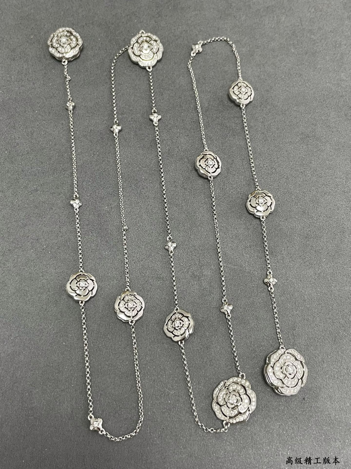 Ch*el camellia sweater necklace