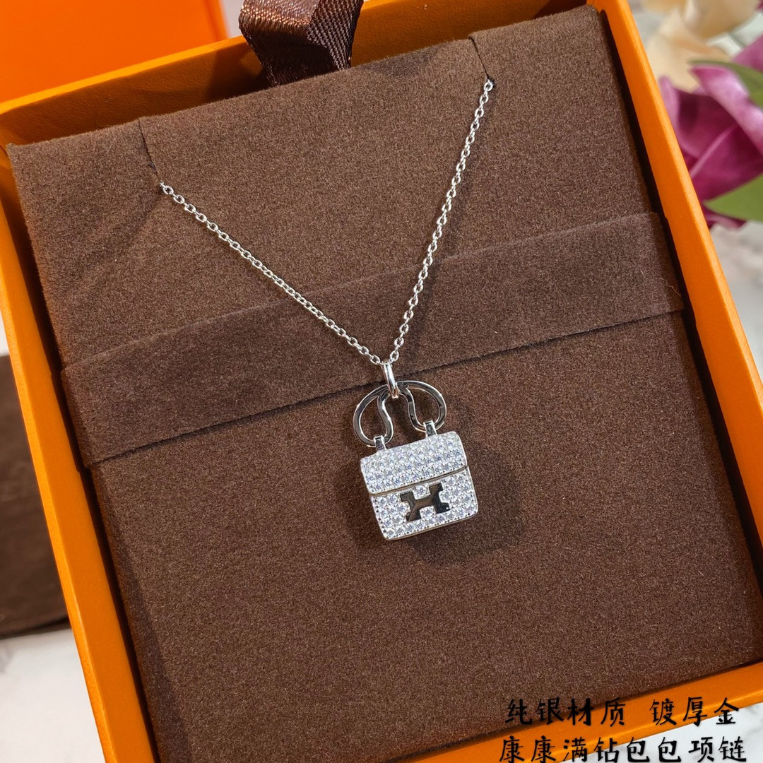 hermès fully Di*m*nd-encrusted h bag necklace